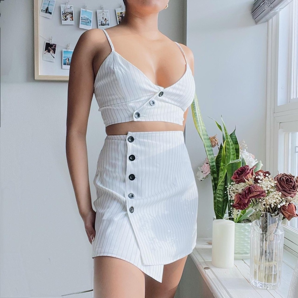 Gorgeous white with black stripes 2 piece set. This set is from Dynamite